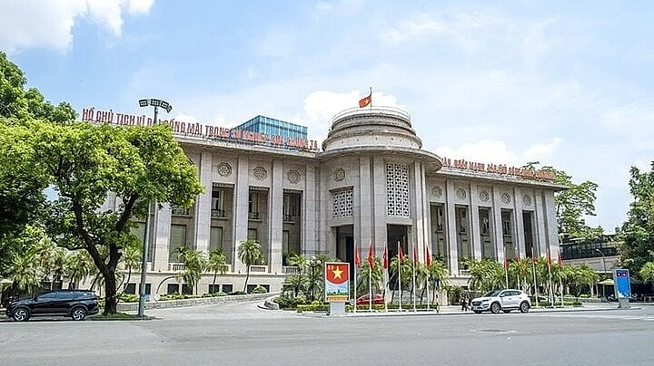 Vietnamese, Lao central banks discuss cooperation in using local currencies in bilateral trade