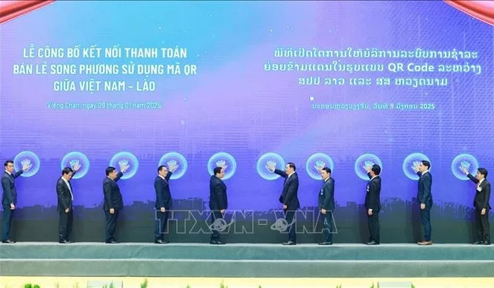 Cross-border QR payment service launched between Vietnam and Laos