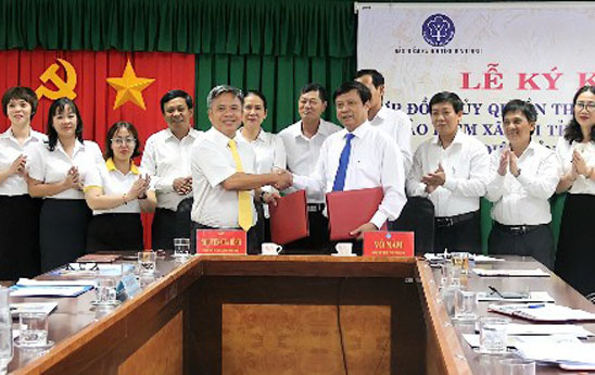 Bưu điện tỉnh Bình Định ký hợp đồng ủy quyền thu BHXH, BHYT