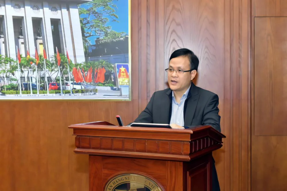 Ông Phạm Chí Quang – Vụ trưởng Vụ Chính sách tiền tệ phát biểu tại cuộc họp