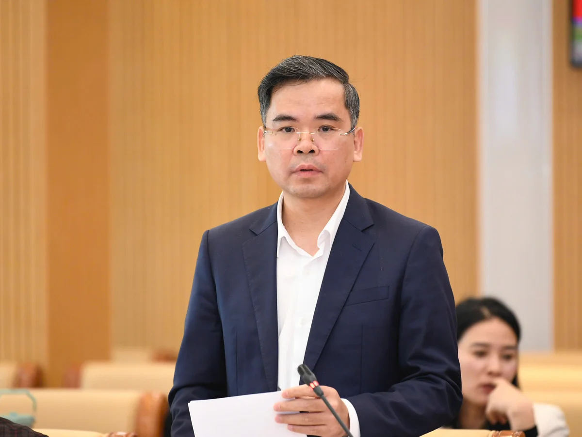 Ông Nguyễn Xuân Bắc - Phó Vụ trưởng Vụ Tín dụng các ngành kinh tế, NHNN trao đổi tại Hội thảo
