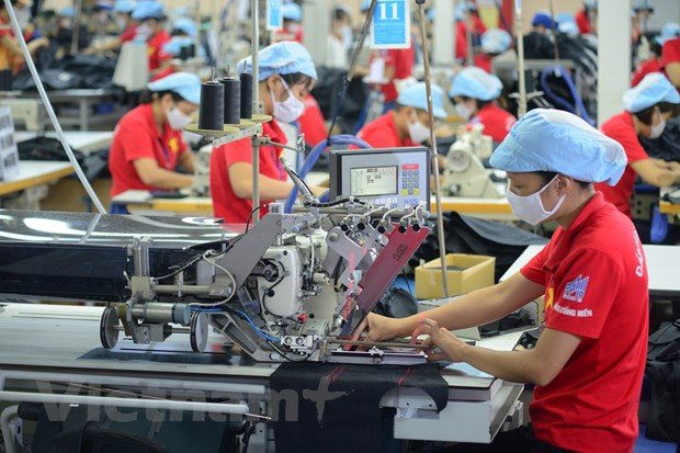 Nhiều doanh nghiệp nhận lãi suất ưu đãi từ ngân hàng. (Ảnh; PV/Vietnam+)