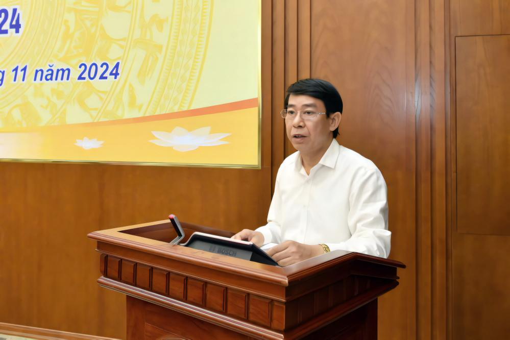 Cục trưởng Cục Phát hành và Kho quỹ Nguyễn Anh Tuấn báo cáo tại Hội nghị