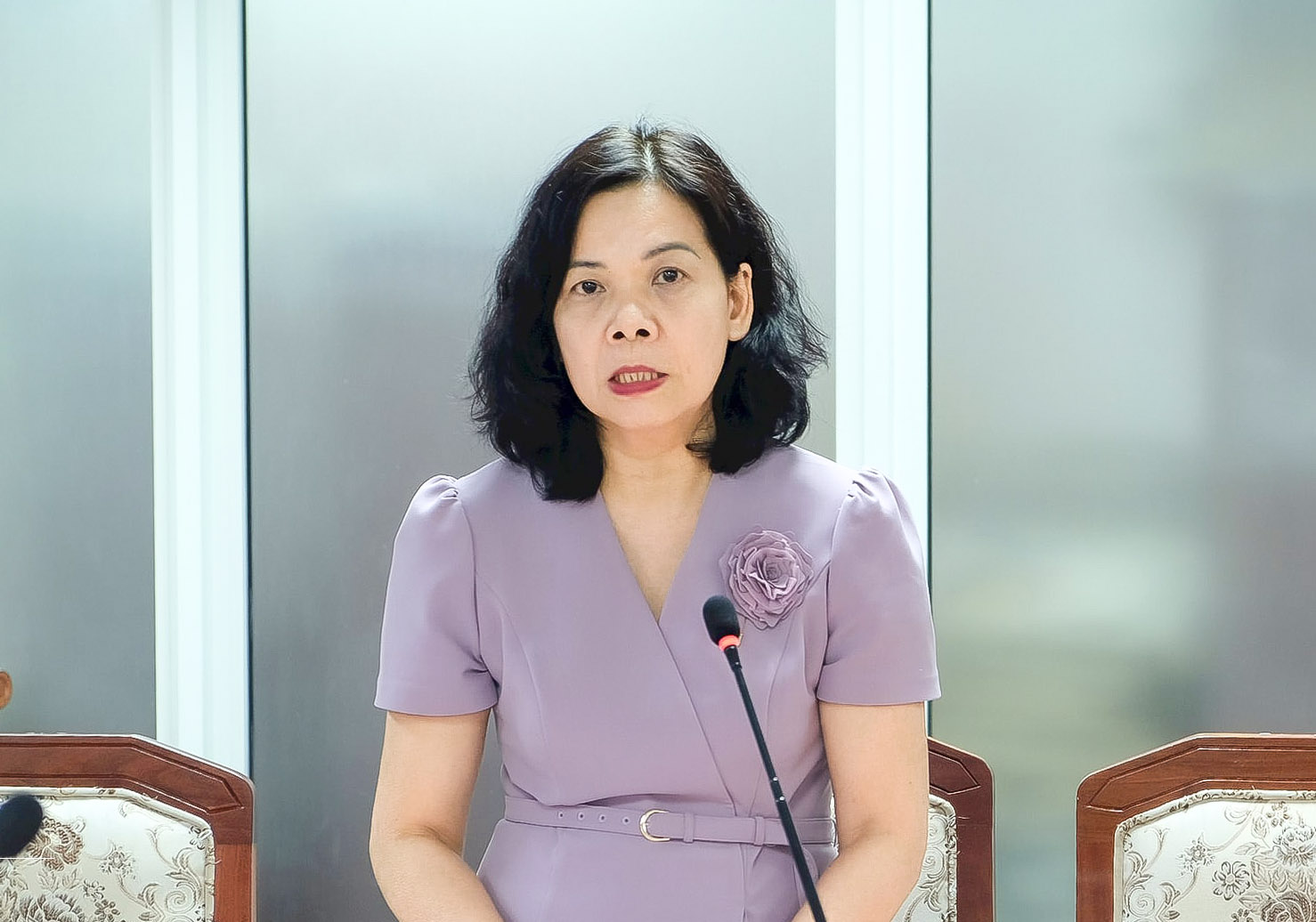 Bà Vũ Ngọc Lan, Phó Vụ trưởng Vụ Pháp chế, Ngân hàng Nhà nước phát biểu tại Hội nghị