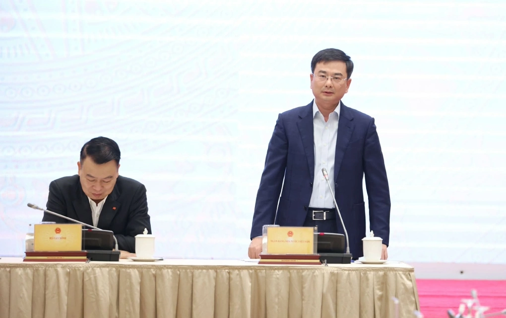 Phó thống đốc Ngân hàng Nhà nước Phạm Thanh Hà trả lời tại họp báo Chính phủ, ngày 6/12. Ảnh: VGP