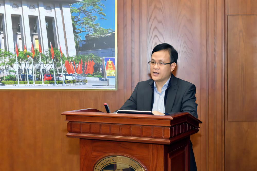 Ông Phạm Chí Quang – Vụ trưởng Vụ Chính sách tiền tệ phát biểu tại cuộc họp