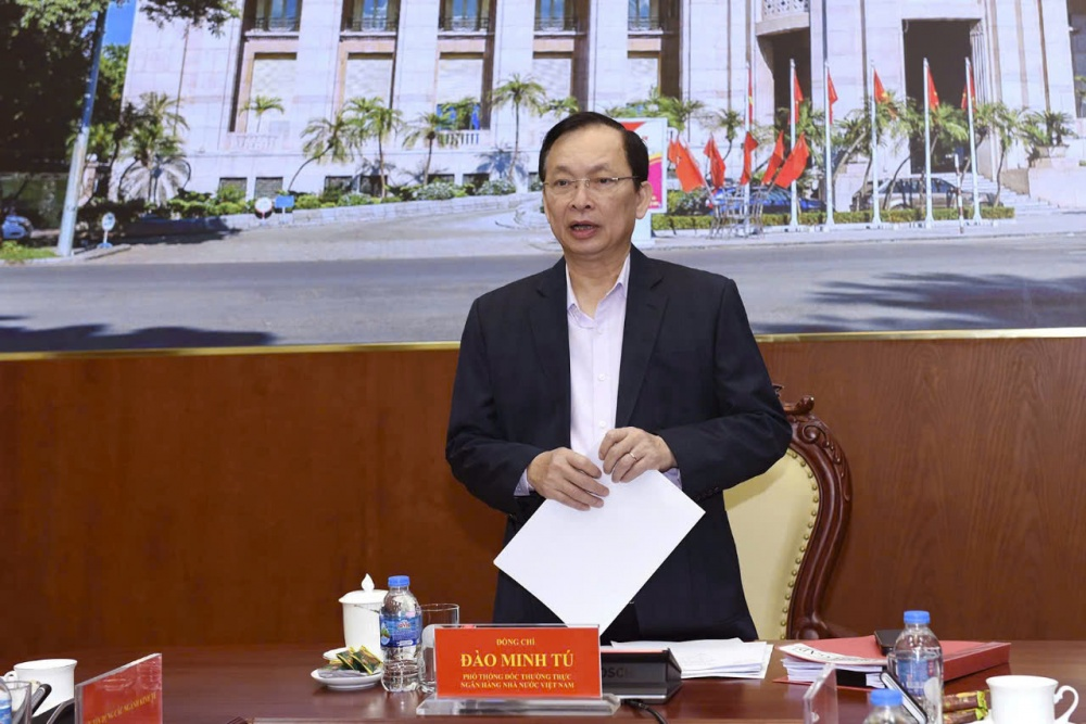 Phó Thống đốc Thường trực NHNN Đào Minh Tú phát biểu tại cuộc họp