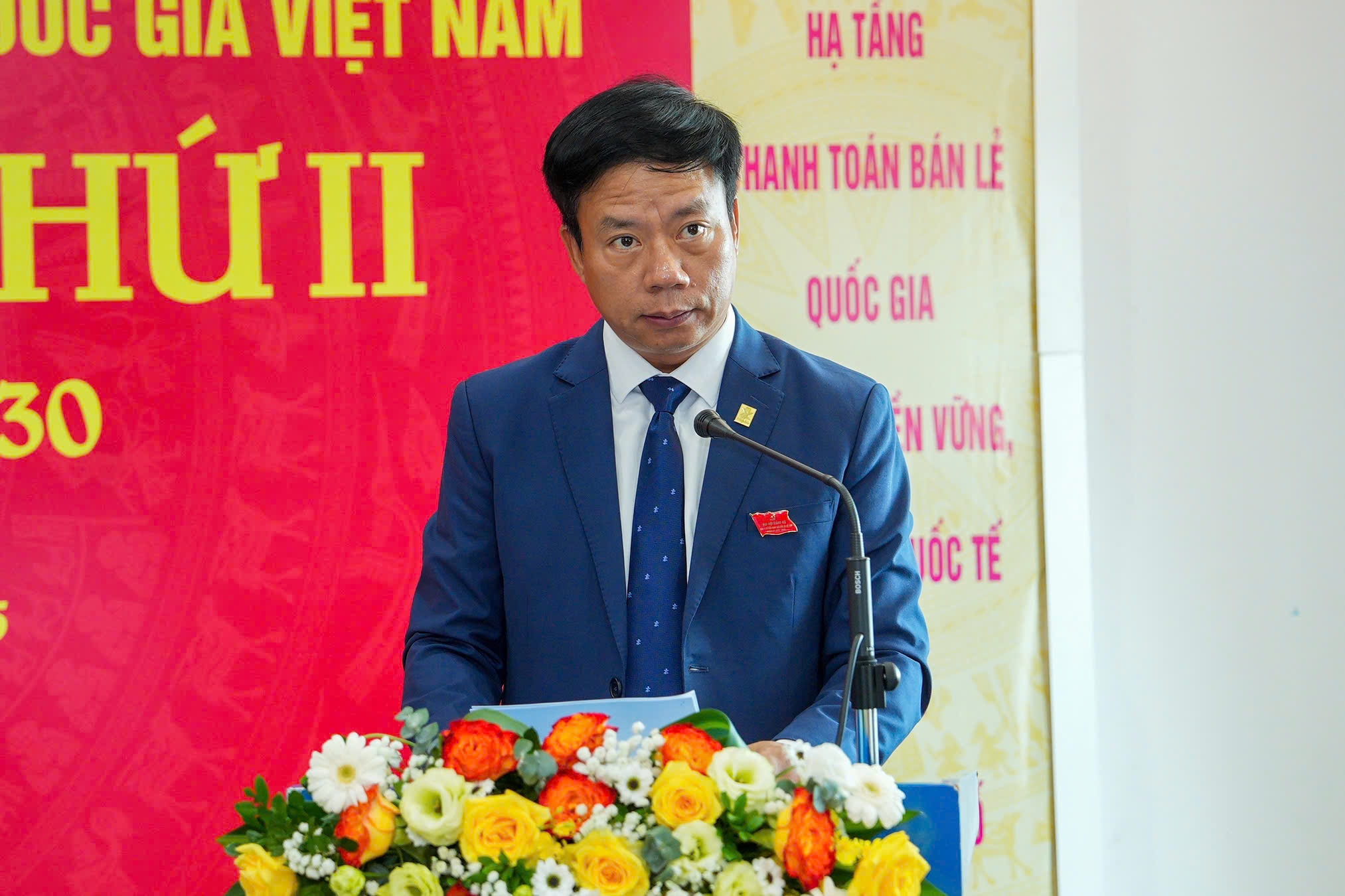 Đồng chí Nguyễn Quang Minh, Phó Bí thư Đảng ủy, Tổng Giám đốc NAPAS phát biểu tại Đại hội