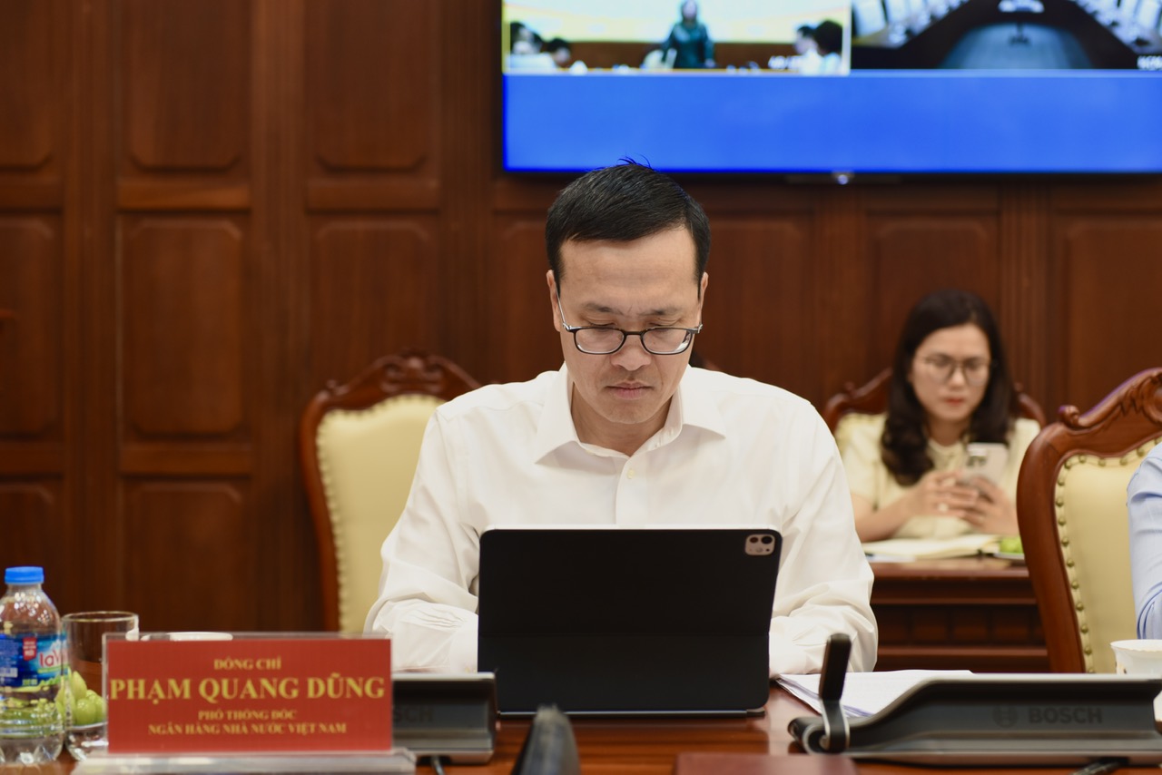 Phó Thống đốc NHNN Phạm Quang Dũng tại cuộc họp