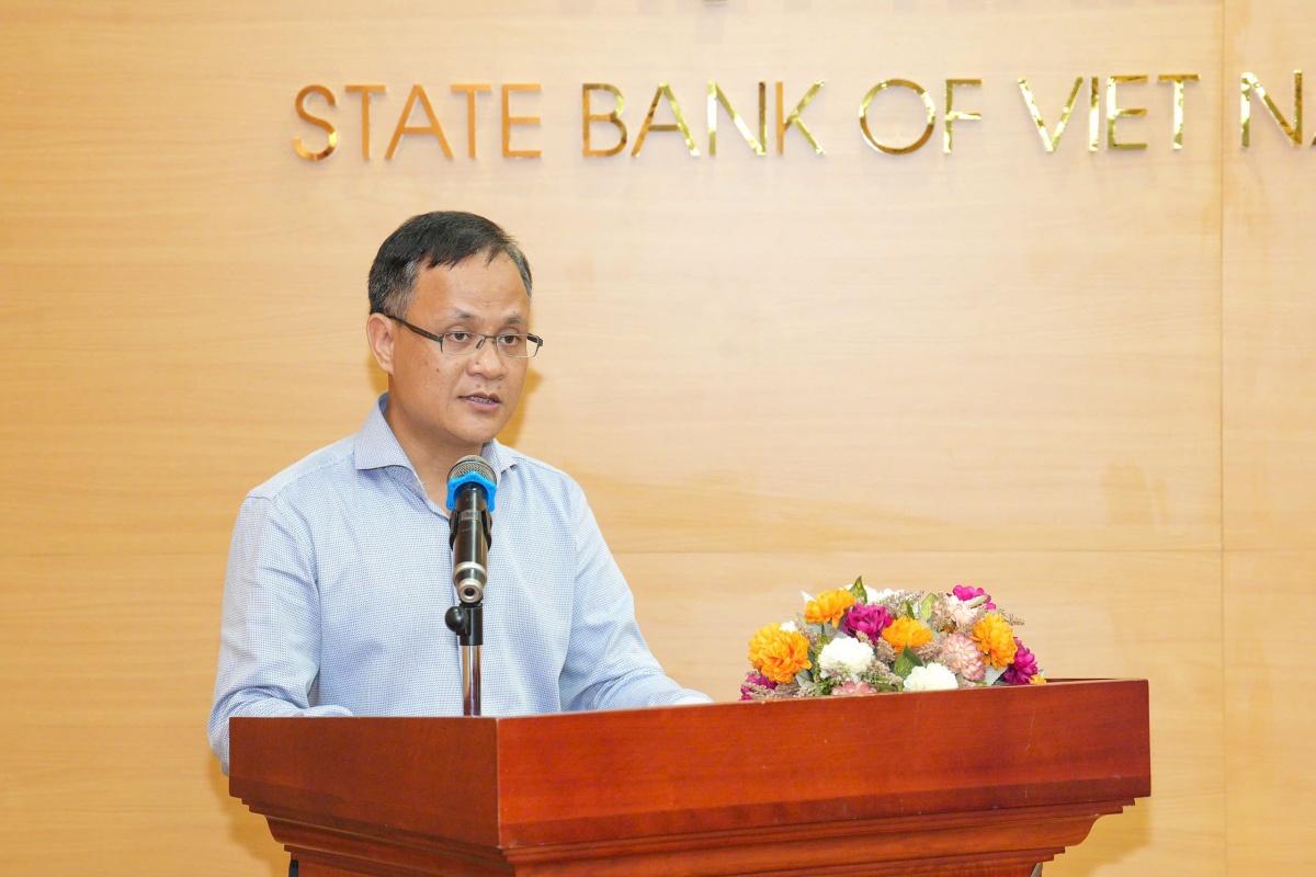 Ông Phạm Chí Quang, Vụ trưởng Vụ Chính sách tiền tệ, NHNN thông tin tại Hội nghị