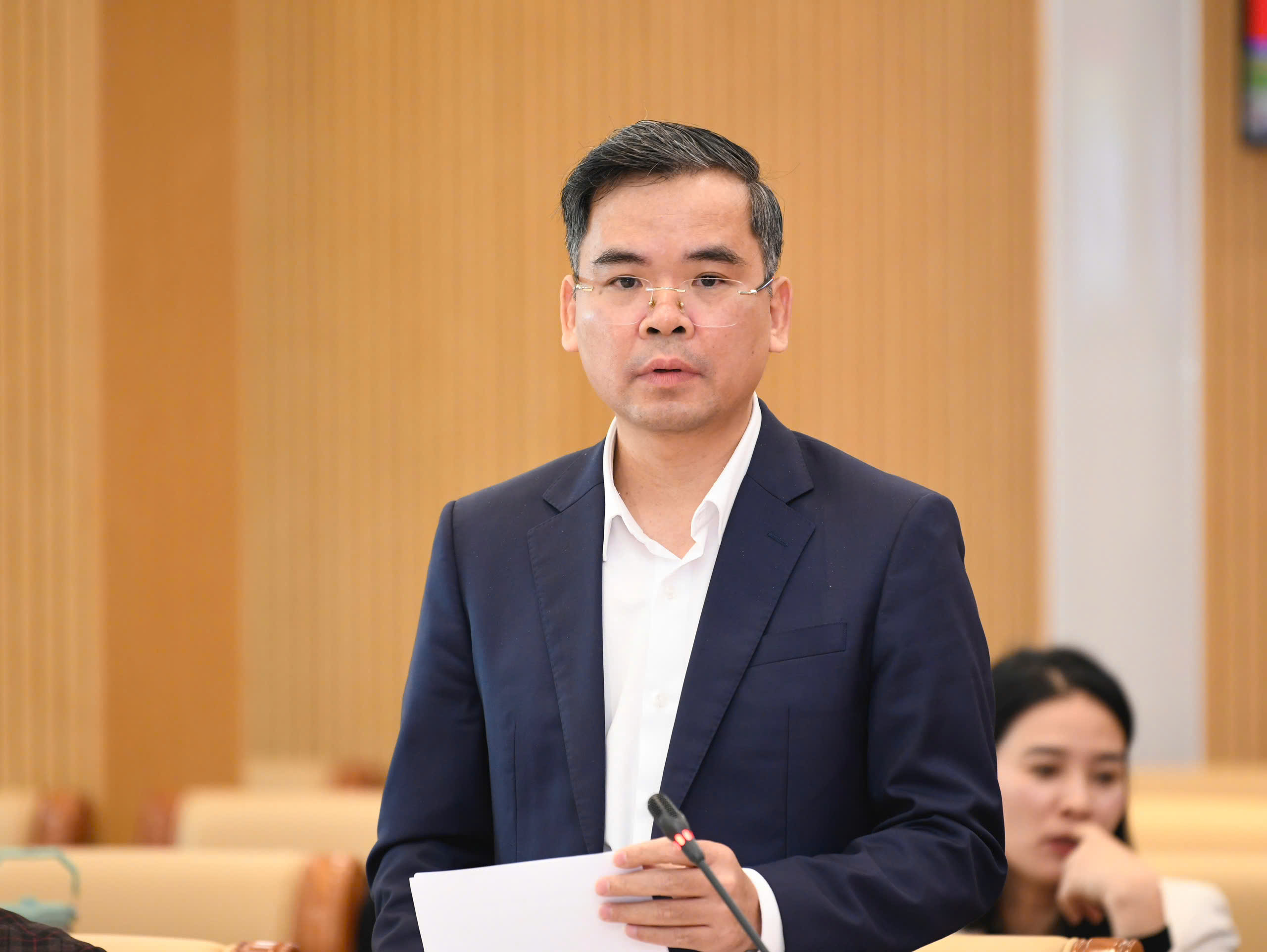 Ông Nguyễn Xuân Bắc - Phó Vụ trưởng Vụ Tín dụng các ngành kinh tế, NHNN trao đổi tại Hội thảo