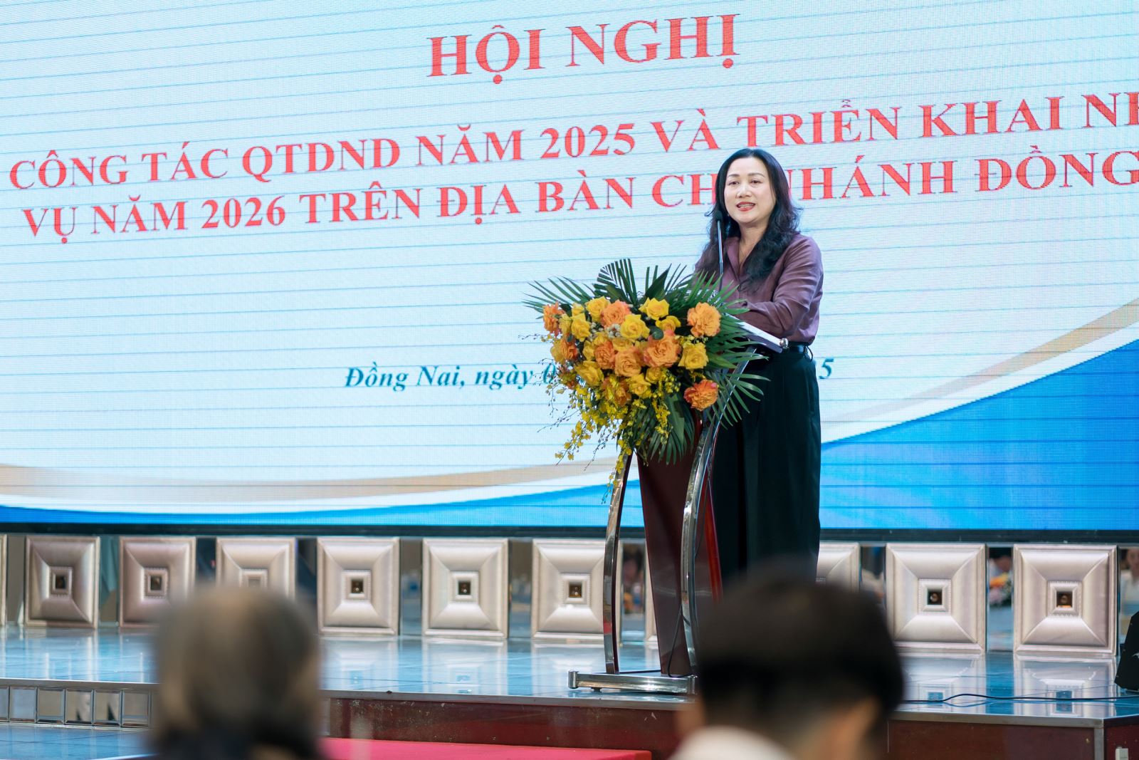 Bà Nguyễn Thị Thu Cúc - Phó Tổng Giám đốc Co-opBank phát biểu tại Hội nghị triển khai công tác QTDND năm 2026 trên địa bàn Co-opBank chi nhánh Đồng Nai phụ trách