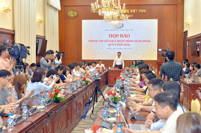 A view of the event. Bank credit in the period focused on business and production, economic growth drivers and priority sectors, especially industry, agriculture and rural development, small- and medium-sized enterprises, trade and services. — VNS Photo Photo