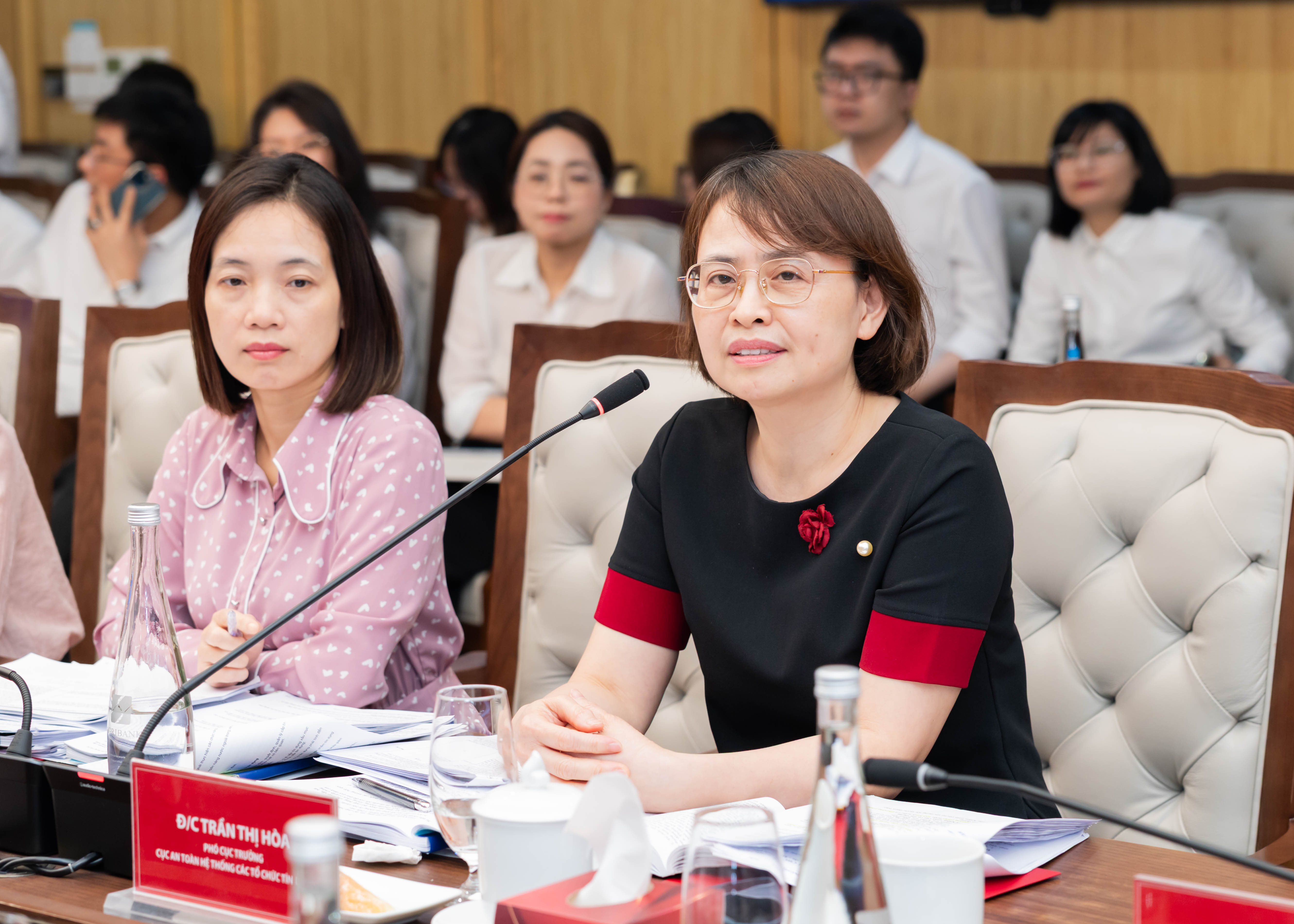 Bà Trần Thị Hòa – Phó Cục trưởng Cục An toàn hệ thống các tổ chức tín dụng (Ngân hàng Nhà nước) nội dung thảo luận tại Hội thảo