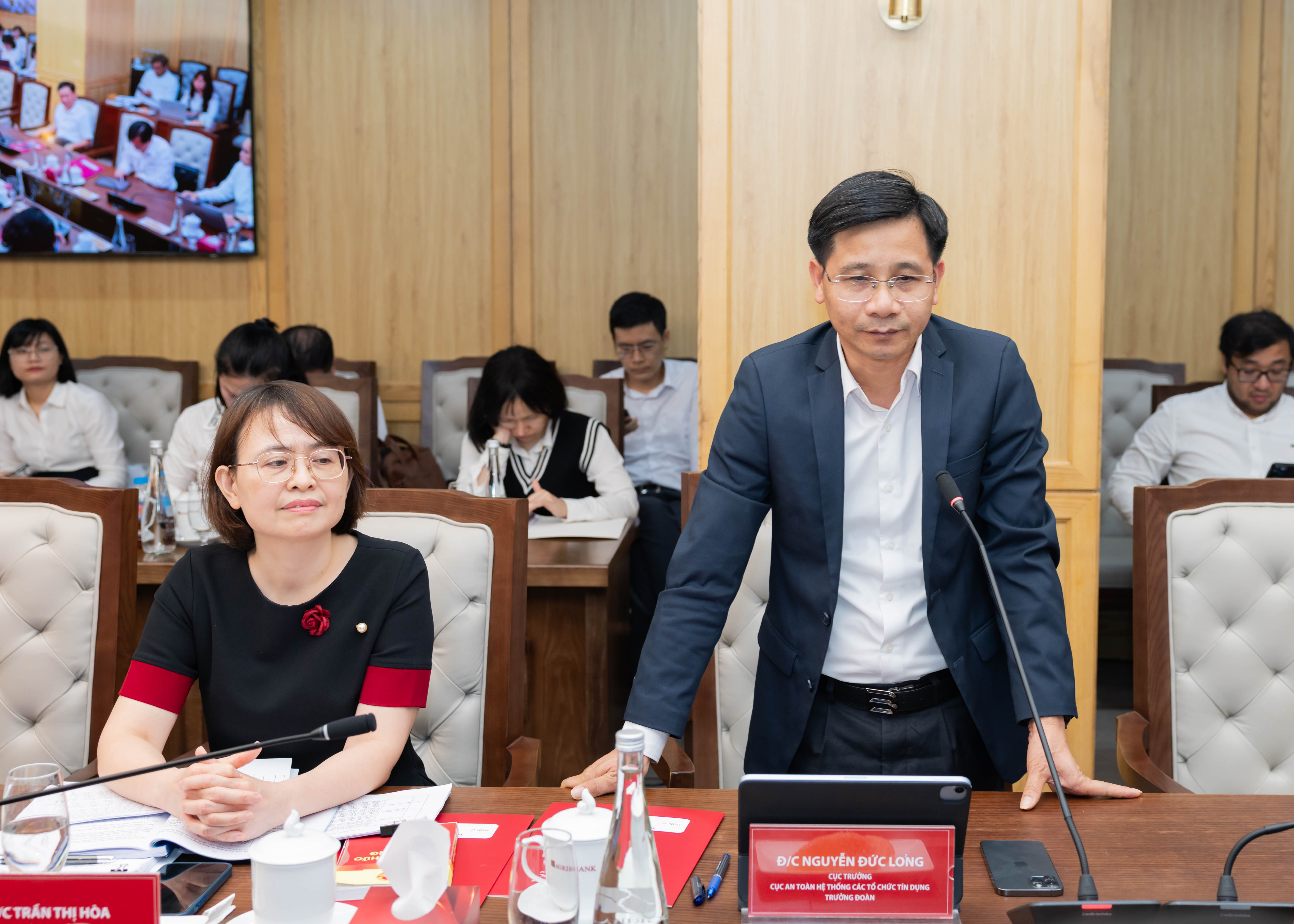 Ông Nguyễn Đức Long – Cục trưởng Cục An toàn hệ thống các tổ chức tín dụng (Ngân hàng Nhà nước) phát biểu tại Hội thảo