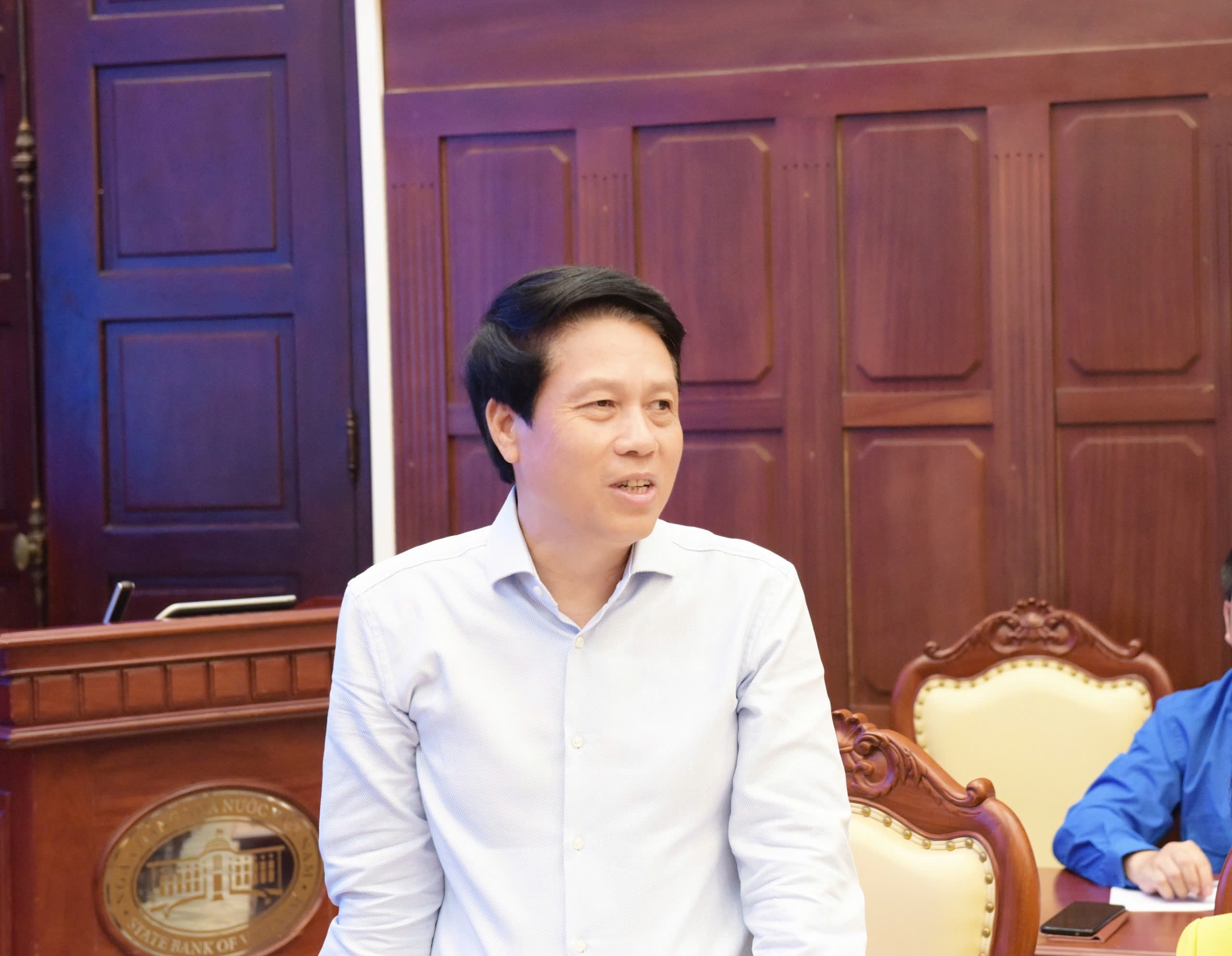 Đồng chí Phạm Tiến Dũng - Ủy viên Ban Thường vụ Đảng ủy, Phó Thống đốc NHNN phát biểu tại Hội nghị