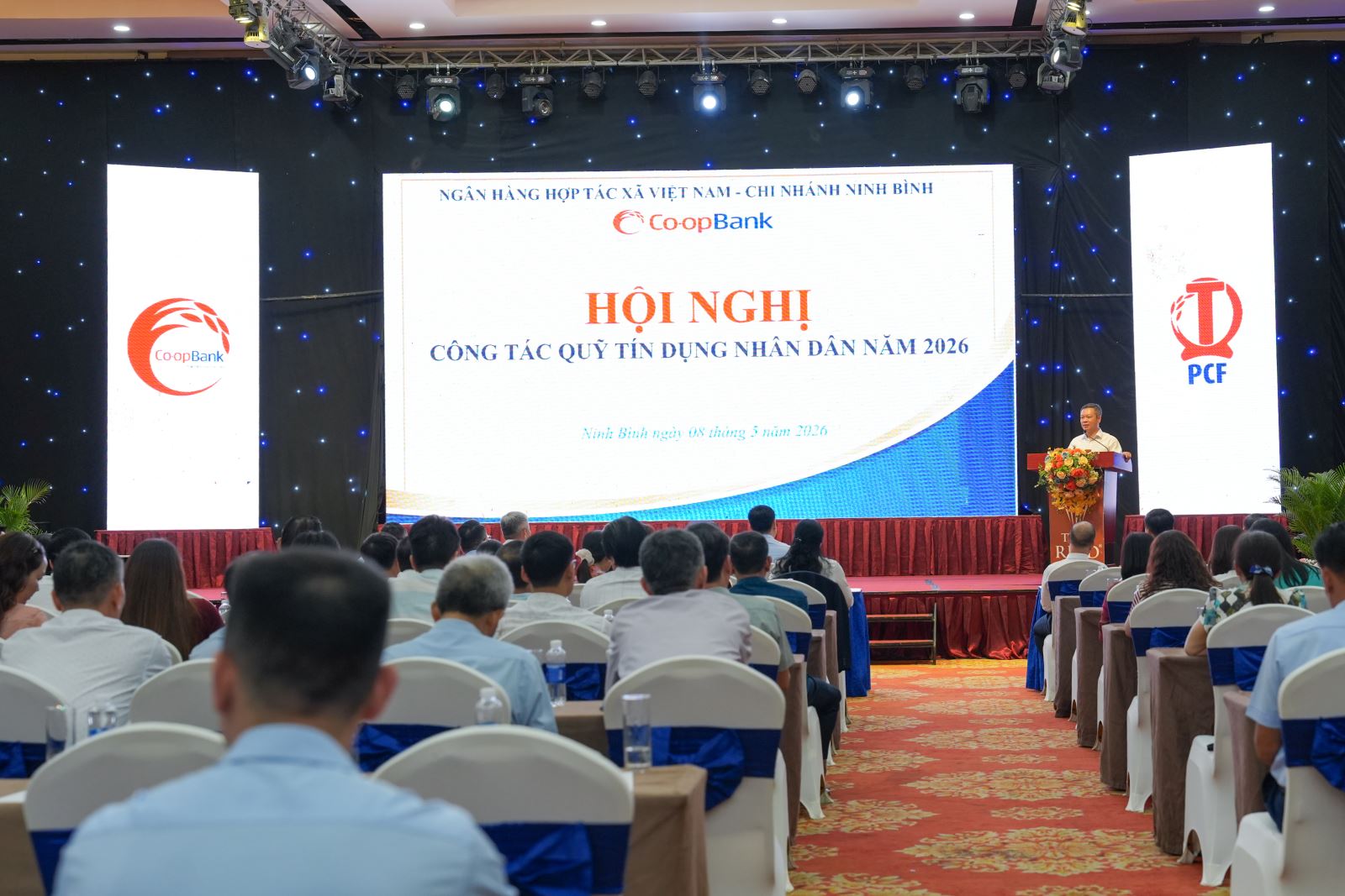 Bộ nhận diện thương hiệu của hệ thống QTDND được sử dụng rộng rãi trong các Hội nghị QTDND. (Ảnh minh họa)