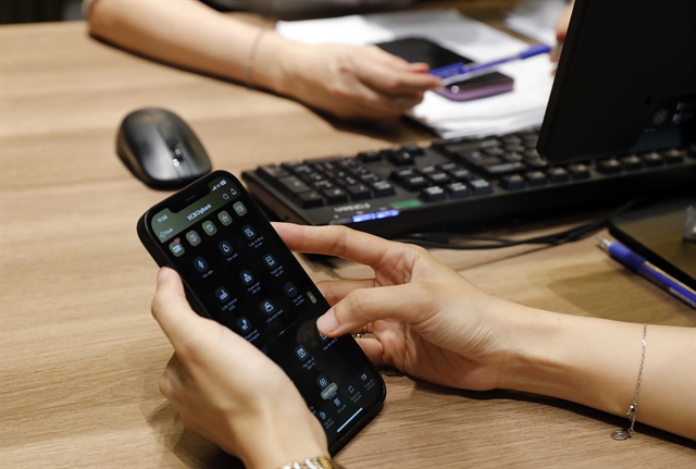 Vietnamese banks are tightening transaction controls and deploying digital tools to detect risks earlier and better protect customers. — VNA/VNS Photo Trần Việt